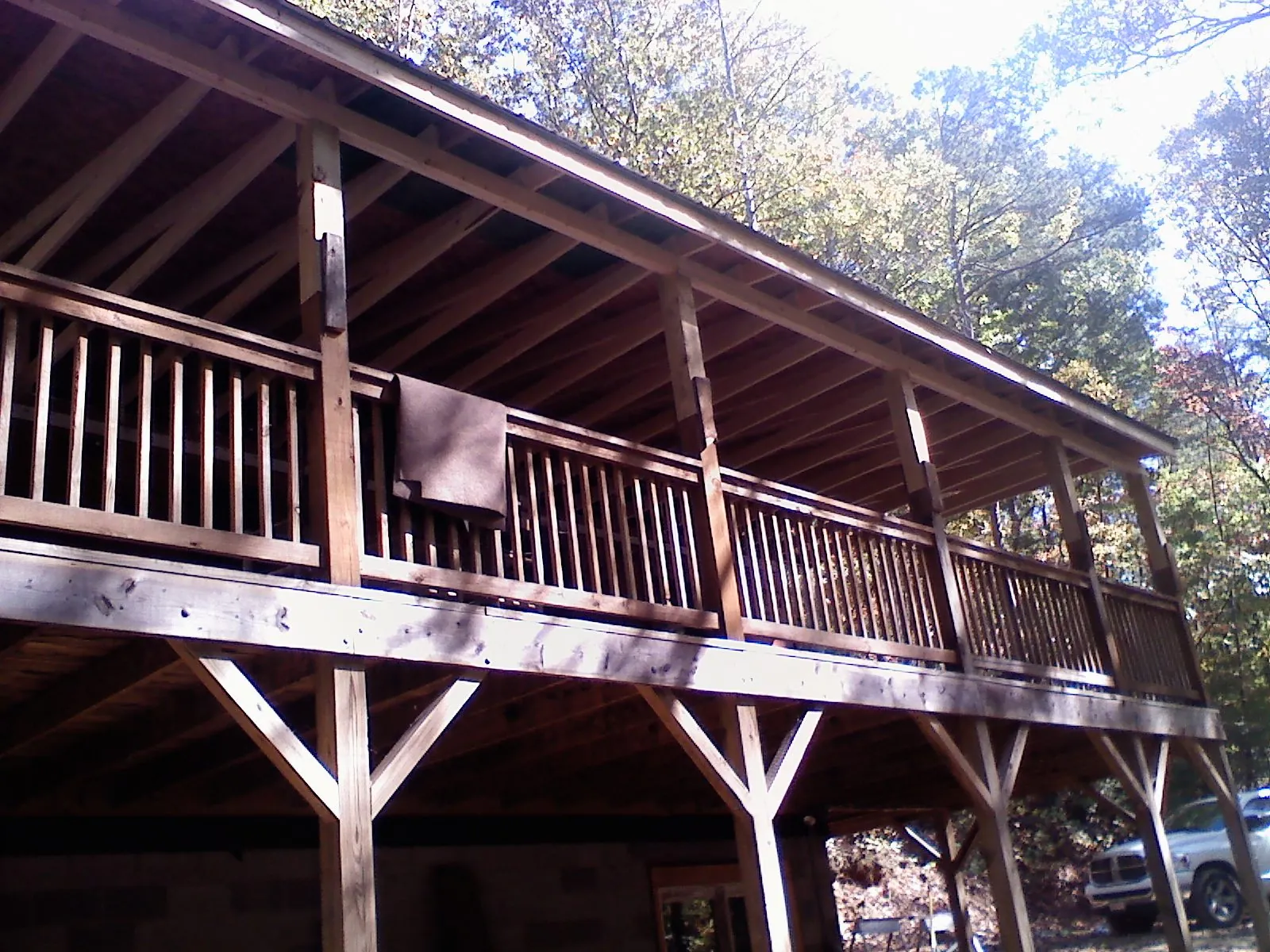 Timber framing under a new elevated porch and deck — Roof Leak Repair in Payson by Roofing Brothers